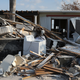 Debris sits in front of a home that was damaged by hurricane Irma on September 19, 2017 in Marathon, Florida.